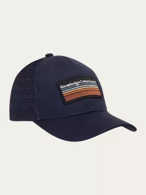 Badge twill trucker cap - Total Eclipse