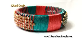 Silk Kada bangle in shades of Teel and Peach!Sold as a single piece!